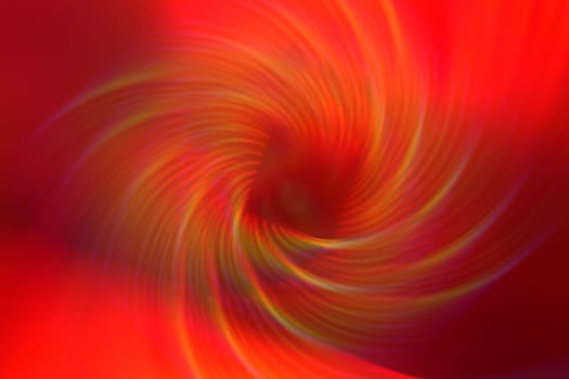 Abstract red background with optical swirling yellow rays.