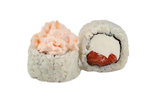 Sushi rolls with rice and tuna close-up on a white background.