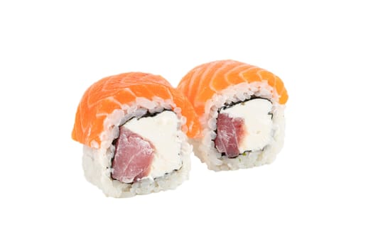 Sushi closeup isolated on white background. Sushi roll baked with red fish, trout, Philadelphia cheese and mussels. Japanese restaurant menu.