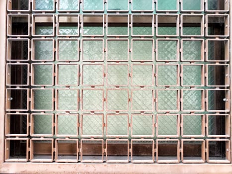 Grid pattern background showcases a metallic frame around textured glass, providing a perfect area for text and clear visual appeal.