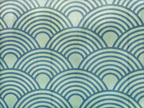 Vibrant blue and green curved lines form a harmonious wave pattern, providing a calming backdrop for creative projects.
