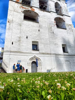 Yaroslavl, Russia - July 05, 2024: Groups of tourists explore the beautiful architecture of the Kremlin in Yaroslavl while enjoying the vibrant scenery.