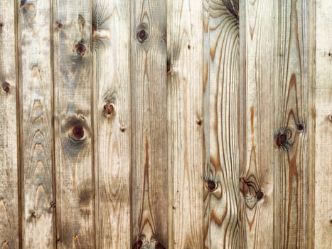 This surface features a rustic wooden texture with visible knots and grains, perfect for adding a natural element to any design or project.