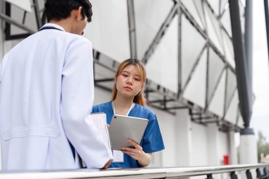 Healthcare professionals collaborate on strategies for improving patient care in a facility emphasizing teamwork and innovation.