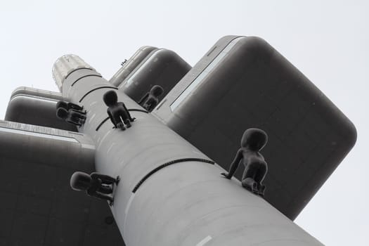 PRAGUE, CZECH REPUBLIC - December 26, 2014: Zizkov telecommunication tower with unique sculptures of babies by Czech artist David Cerny
