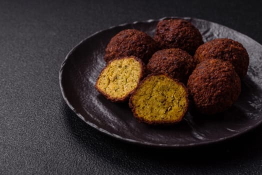 Fried chickpea falafel balls with salt, spices and herbs. Vegetarian and vegan dish