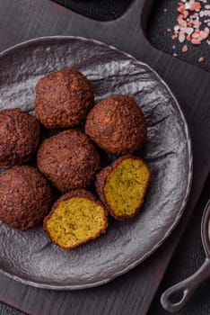 Fried chickpea falafel balls with salt, spices and herbs. Vegetarian and vegan dish