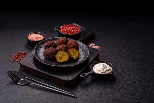 Fried chickpea falafel balls with salt, spices and herbs. Vegetarian and vegan dish