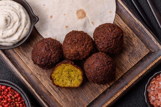 Fried chickpea falafel balls with salt, spices and herbs. Vegetarian and vegan dish