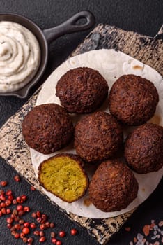 Fried chickpea falafel balls with salt, spices and herbs. Vegetarian and vegan dish