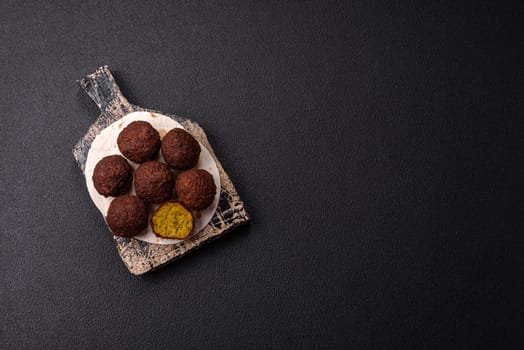 Fried chickpea falafel balls with salt, spices and herbs. Vegetarian and vegan dish