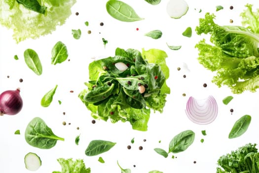 Green Lettuce Leaves and onions fly in the air on a white isolated background.