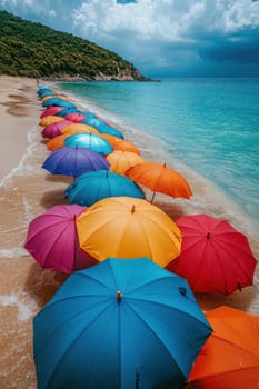 Lots of colored umbrellas to create shade on a hot day at the beach. Colorful umbrellas are spread out on the tropical beach.