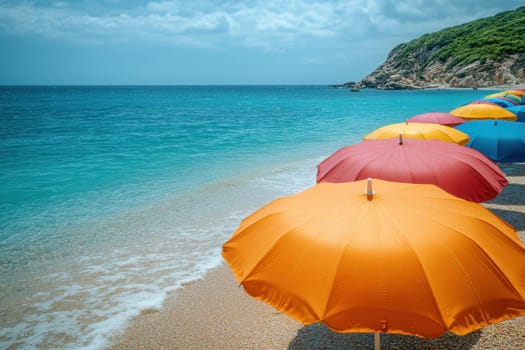 Colorful umbrellas lie on the tropical beach. Rain umbrellas in good weather.