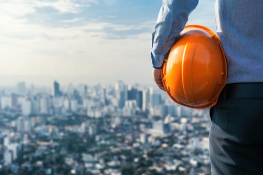 An architect stands holding a hard hat, gazing at a panoramic city skyline. The image captures a professional in a modern urban environment, symbolizing innovation and progress.