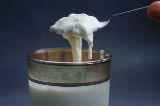 glass of whole cream milk on table ,