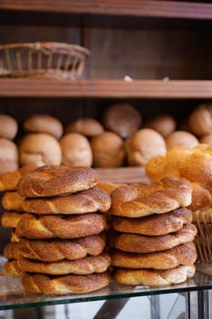 A tempting display of various breads in a bakery that will make anyone crave them
