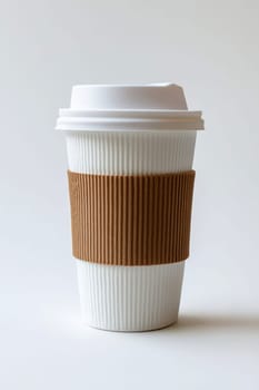 A close-up of a disposable coffee cup for mockup with a textured cardboard sleeve and a secure plastic lid isolated on white background..