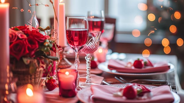 Festive table setting with candles and arrangement of beautiful red flowers. Holiday concept. High quality photo