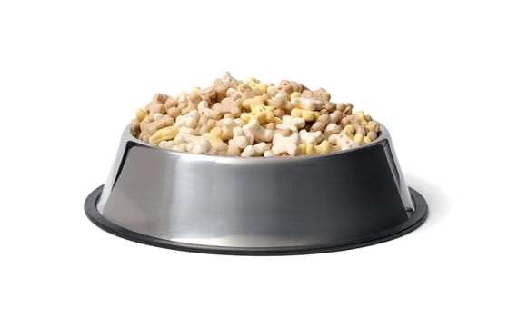 Dry dog food in a bowl on a white background. Isolated