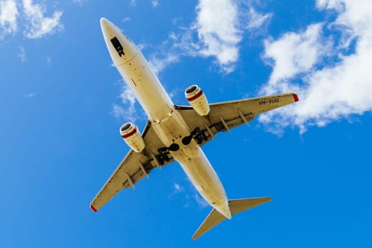 MELBOURNE, AUSTRALIA - SEPTEMBER 07, 2024: A Virgin Australia Boeing 737-8FE flies into Melbourne on September 7th 2024