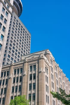 Architecture of historic and modern buildings in downtown of Vancouver, Canada.