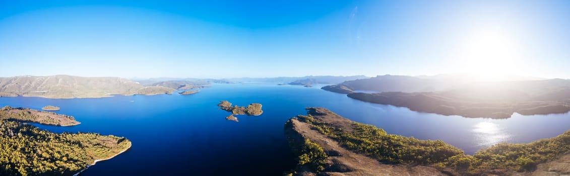 Aerial landscape of Lake Pedder on a hot summer's afternoon in Southwest National Park, Tasmania, Australia
