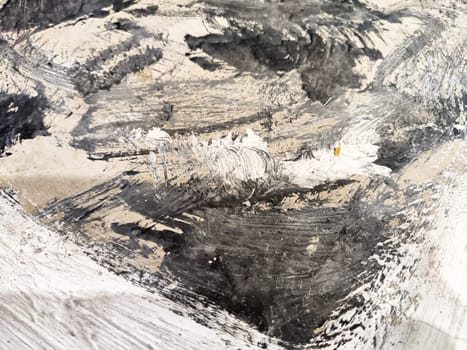 An abstract background showcases an interplay of dark and light textures, ideal for adding depth to artistic designs or presentations.