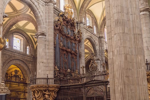 Majestic view of Mexico City Metropolitan Cathedral, a historic architectural landmark. Heritage, religion, and cultural tourism in Latin America. Symbol of history and faith in Mexico.
