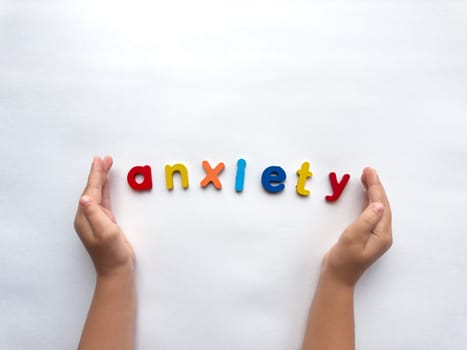 Children coping with anxiety. Helping hands and alphabet therapy.