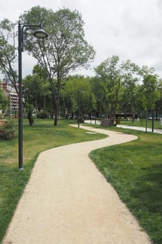 pov shot of walking on walkway at istanbul park at early morning .