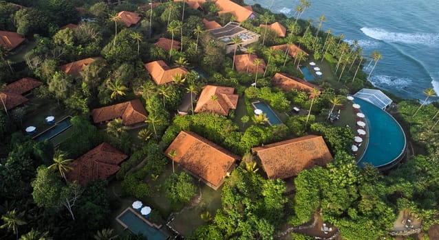 Aerial view of a premium hotel complex with swimming pools in Sri Lanka. High quality photo