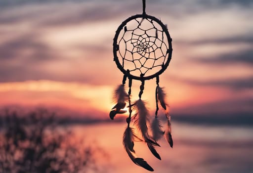 Dreamcatcher sunset sky, boho chic, ethnic amulet symbol Indigenous Peoples Day and Native Americans Day