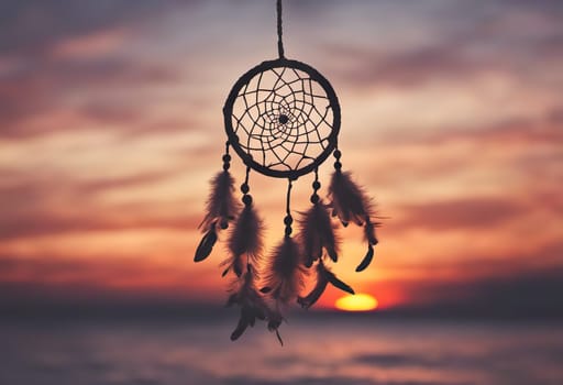 Dreamcatcher sunset sky, boho chic, ethnic amulet symbol Indigenous Peoples Day and Native Americans Day