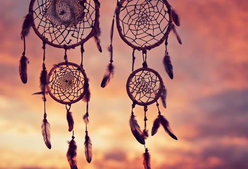 Dreamcatcher sunset sky, boho chic, ethnic amulet symbol Indigenous Peoples Day and Native Americans Day