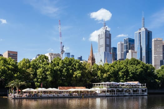 MELBOURNE, AUSTRALIA - JANUARY 08, 2025: Views towards Melbourne CBD and Princes Bridge along the Yarra River from Southbank in Melbourne, Victoria, Australia