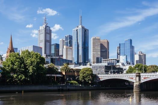 MELBOURNE, AUSTRALIA - JANUARY 08, 2025: Views towards Melbourne CBD and Princes Bridge along the Yarra River from Southbank in Melbourne, Victoria, Australia