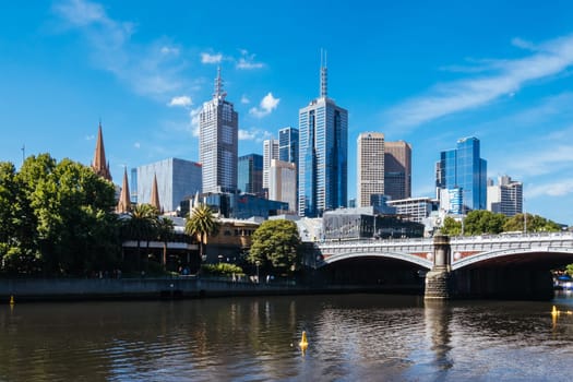 MELBOURNE, AUSTRALIA - JANUARY 08, 2025: Views towards Melbourne CBD and Princes Bridge along the Yarra River from Southbank in Melbourne, Victoria, Australia
