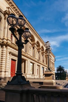 MELBOURNE, AUSTRALIA - JANUARY 8 2025: Old Treasury Building on a hot summer's afternoon in Melbourne CBD, Victoria, Australia