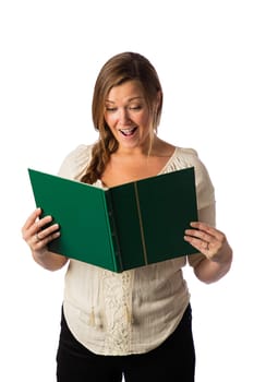 Forty something woman, wearing casual clothes, reading a big green book, against a white background