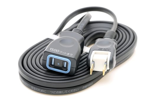 Extension with socket on white background. Electrical power strip or extension block.