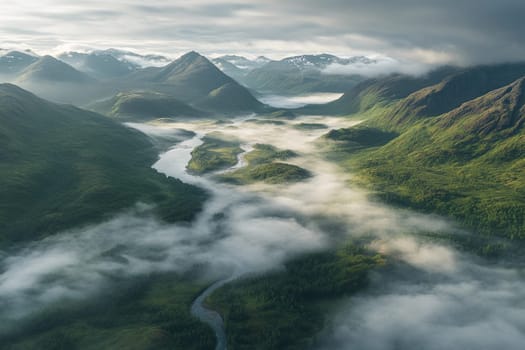 Fog blankets the valley and river, revealing lush greenery and majestic mountains under soft morning light.