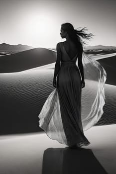 Elegant silhouette of woman in flowing dress stands against dramatic moonlit sky. Ethereal windswept hair and soft light create enchanting atmosphere, evoking feelings of mystery and beauty