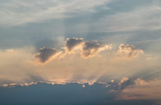 Colorful dramatic sky with cloud before sunset. Amazing clouds like a heaven for background wallpaper and texture, Concept idea of ​​Imaginative clouds nature, use it as your Poster and Space for text, Selective focus.