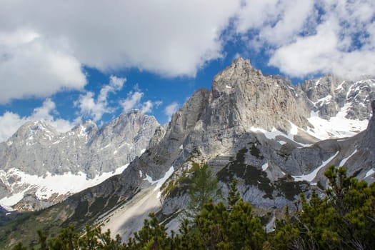 Panorama of massive Alpine mountains. Landscape in the Austrian Alps of the Dachstein region (Styria in Austria)