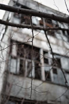 old window in an ancient brick wall in an abandoned farm barn. High quality photo