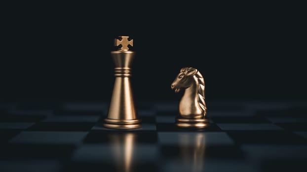 Gold and silver chess pieces in chess board game for business comparison. Leadership concepts, human resource management concepts.