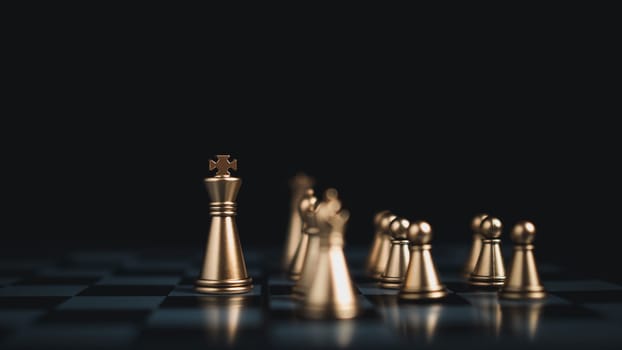 Gold and silver chess pieces in chess board game for business comparison. Leadership concepts, human resource management concepts.