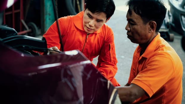 Panoramic banner automotive service mechanic inspect and diagnose car engine issue, repairing and fixing problem in workshop. Technician car care maintenance working on internal components. Oxus