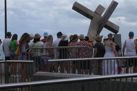 salvador, bahia, brazil - january 2, 2023: Tourists visit the Cruz Caida monument in Praça da Se, historic center of Salvador.